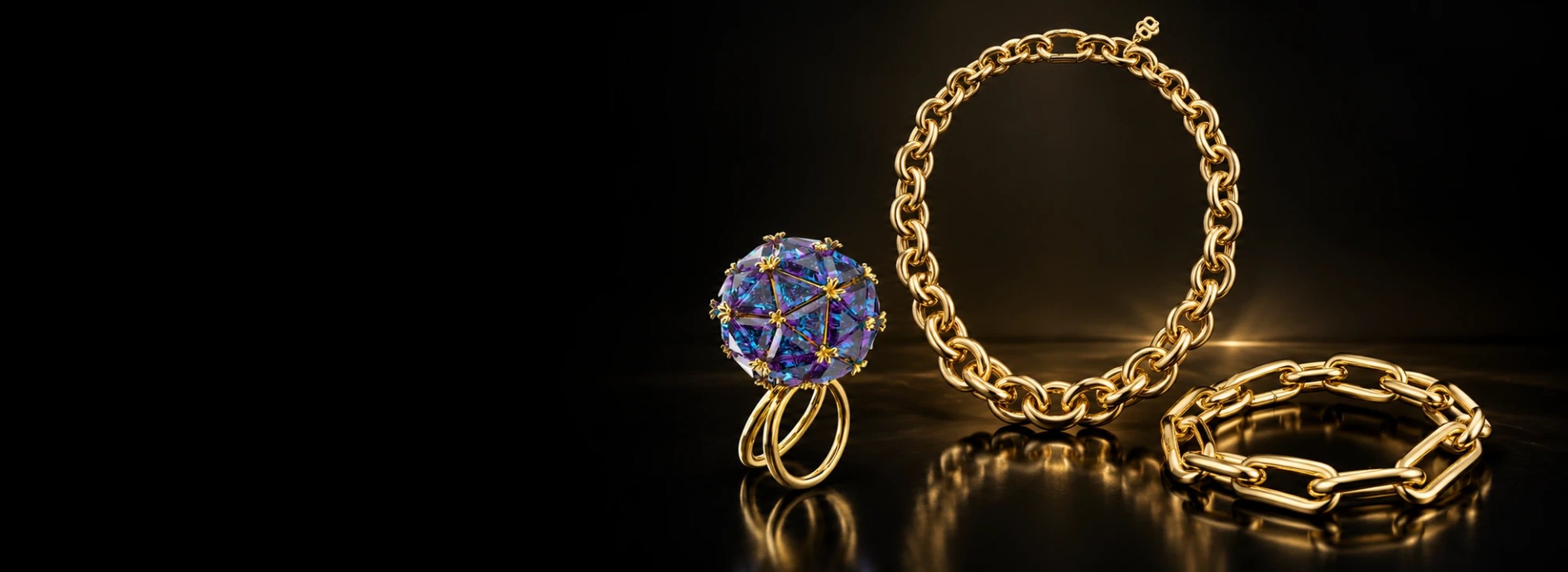 Guldfärgad kedja och armband från BOSS med Swarovski Curiosa ring
