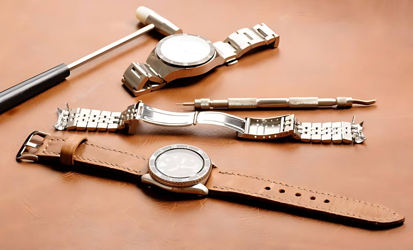 Verktyg för att korta klockarmband bredvid klockor med stållänk och läderarmband
